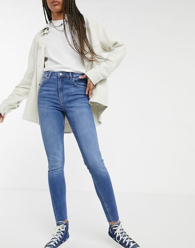 Jeans skinny a vita alta - Bershka - Modalova