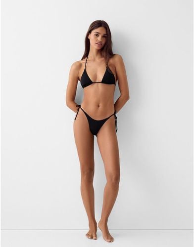 Slip bikini con allacciatura laterale in coordinato - Bershka - Modalova