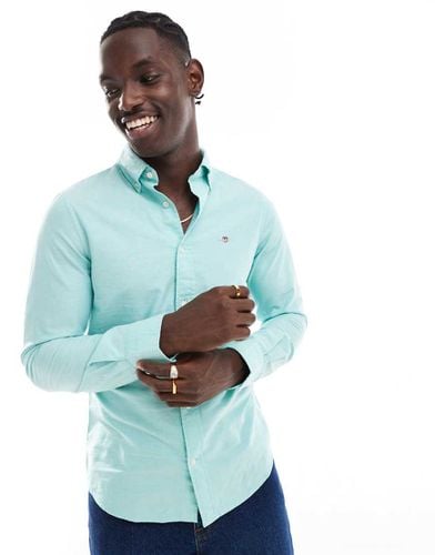 Camicia Oxford slim fit menta con logo dello scudo ricamato - Gant - Modalova