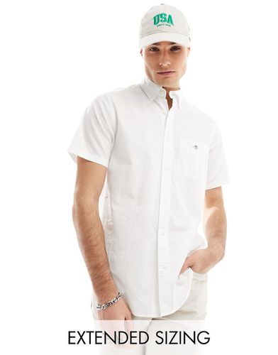 Camicia bianca a maniche corte in lino e cotone con logo a scudo - Gant - Modalova