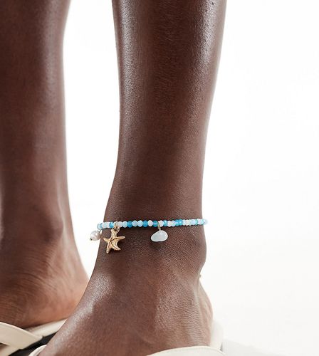 Cavigliera con perline turchese e charms a stella - DesignB London - Modalova