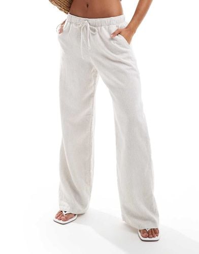 Pantaloni in lino beige a righe con vita elasticizzata - Hollister - Modalova