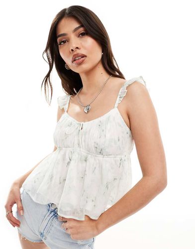 Top stile babydoll in chiffon a fiori con spalle scoperte - Hollister - Modalova