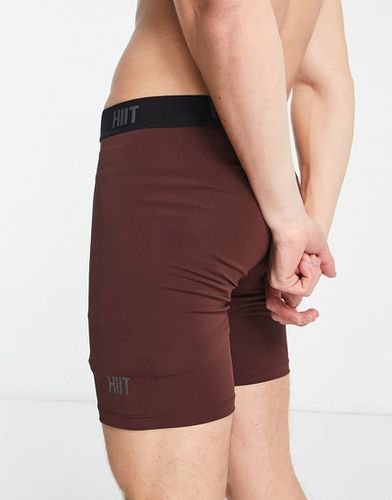 Pantaloncini leggings da allenamento marroni - HIIT - Modalova