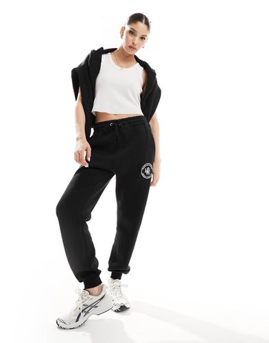 X Perrie Sian - Joggers neri con ricamo in coordinato - In The Style - Modalova