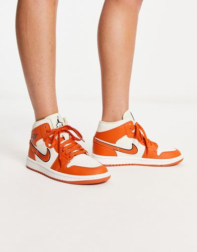 AJ1 Mid - Sneakers alte arancioni - Jordan - Modalova