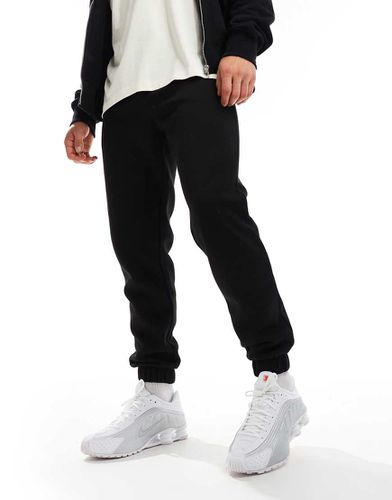 Joggers felpati neri - JJ Rebel - Modalova