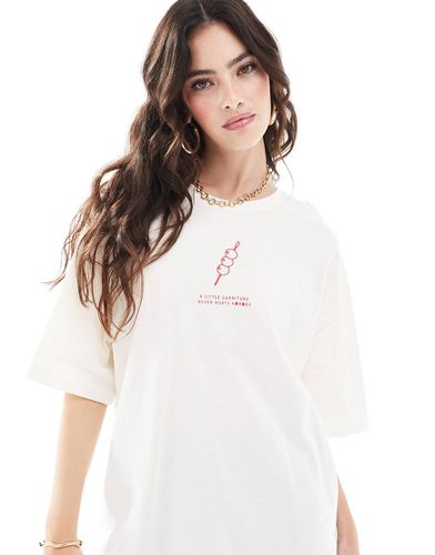 T-shirt oversize bianca con grafica di olive - ONLY - Modalova