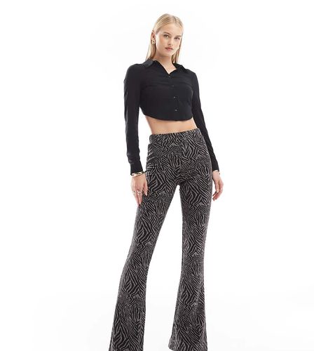 Pantaloni a zampa neri glitterati - ONLY Tall - Modalova