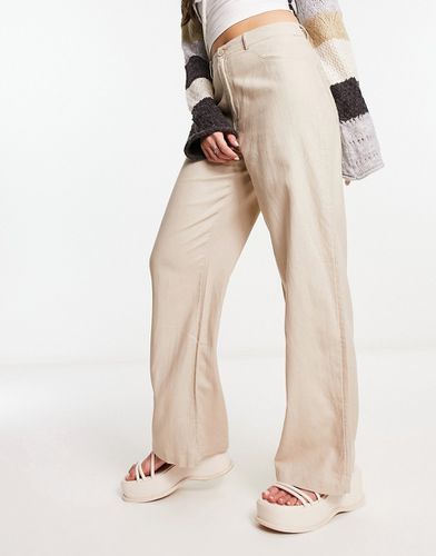 Pantaloni a vita alta in lino beige a fondo ampio - ONLY - Modalova