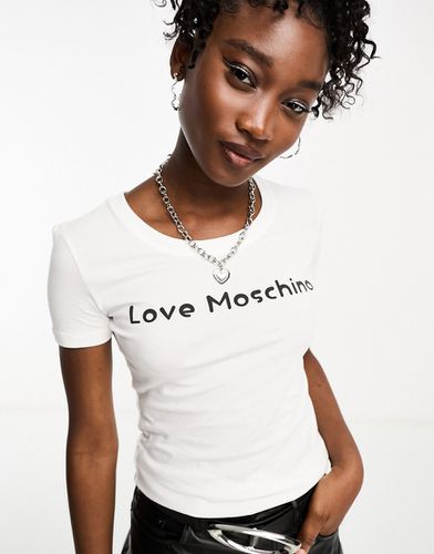 T-shirt attillata bianca con logo - Love Moschino - Modalova