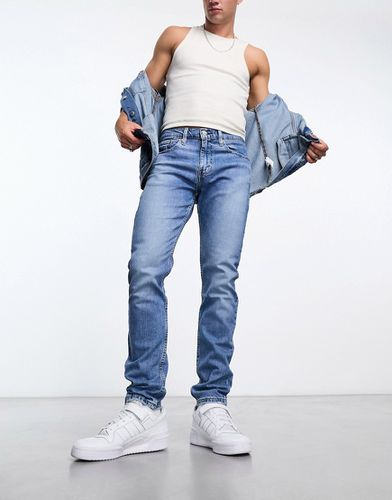Jeans slim affusolati lavaggio chiaro - Levi's - Modalova