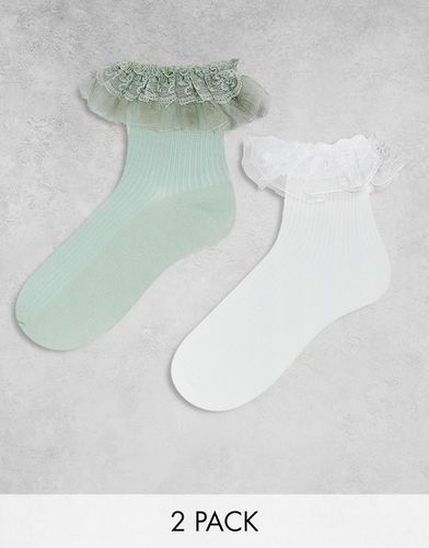 Confezione da 2 paia di calzini con volant bianchi e verdi - Monki - Modalova