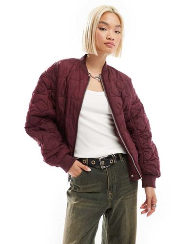 Giacca bomber oversize double-face con un lato rosa e l'altro color bordeaux con finitura trapuntata a stelle - Monki - Modalova