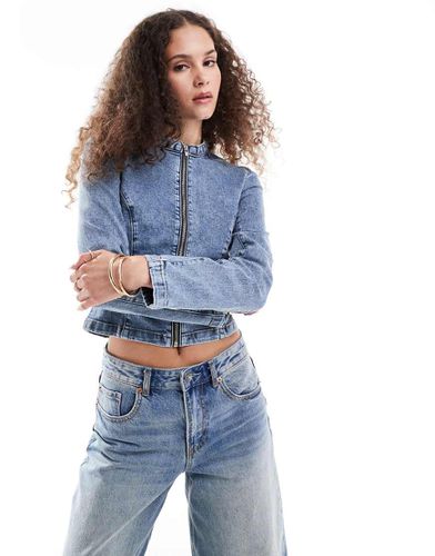 Giacca di jeans aderente medio con zip - Monki - Modalova