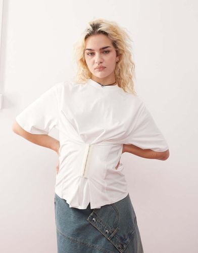 T-shirt oversize bianca con vita a corsetto - Monki - Modalova