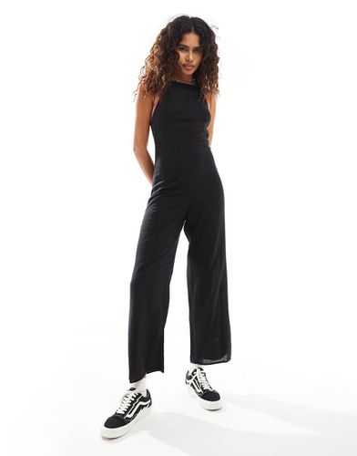 Tuta jumpsuit a fondo ampio con scollo squadrato nera - Monki - Modalova