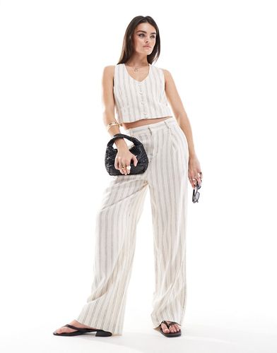 Pantaloni bianchi in misto lino a righe in coordinato - Mango - Modalova