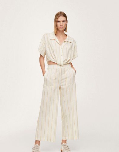 Tuta jumpsuit bianca in lino a righe con cut-out - Mango - Modalova
