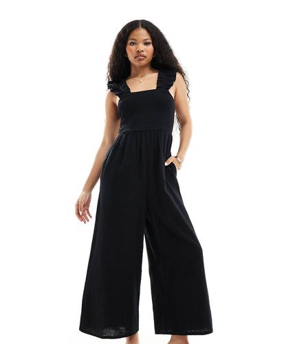 Nobody's Child Petite - Maya - Tuta jumpsuit a fondo ampio nera - Nobody’s Child Petite - Modalova