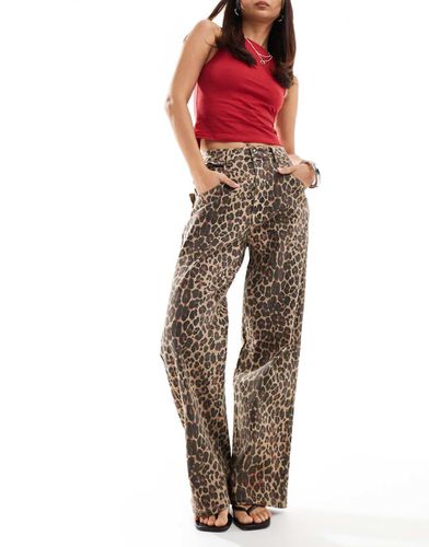 Jeans con stampa leopardata e dettagli smerlati - Never Fully Dressed - Modalova