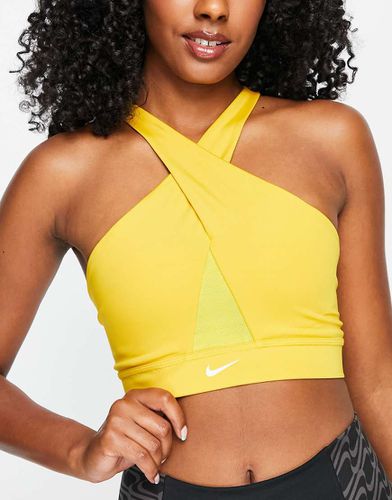 Icon Clash Dri-FIT - Reggiseno sportivo avvolgente a supporto leggero scuro con logo - Nike Training - Modalova