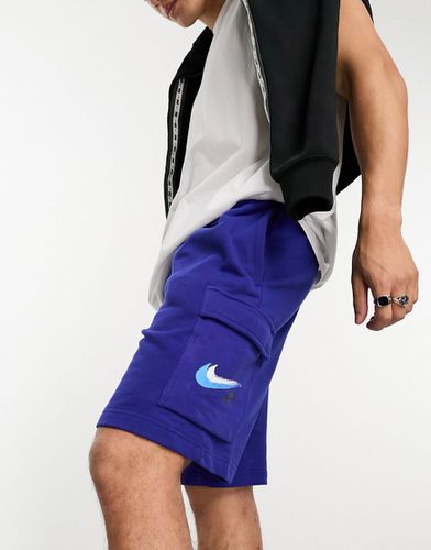 Pantaloncini cargo reale intenso con logo stile graffiti - Nike - Modalova