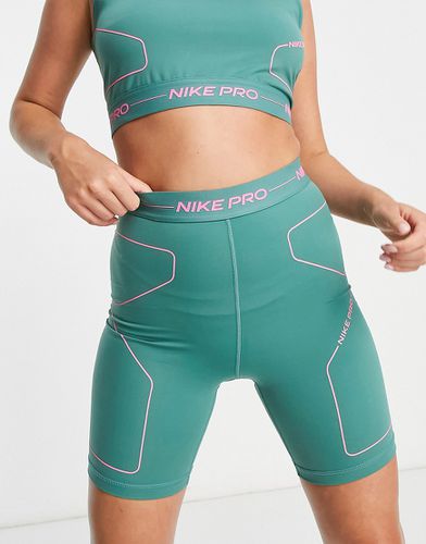 Nike - Pro Training Seasonal - Pantaloncini a vita alta verdi e rosa - Nike Training - Modalova