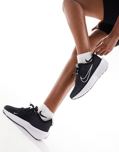 Interact Run - Sneakers bianche e nere - Nike Running - Modalova