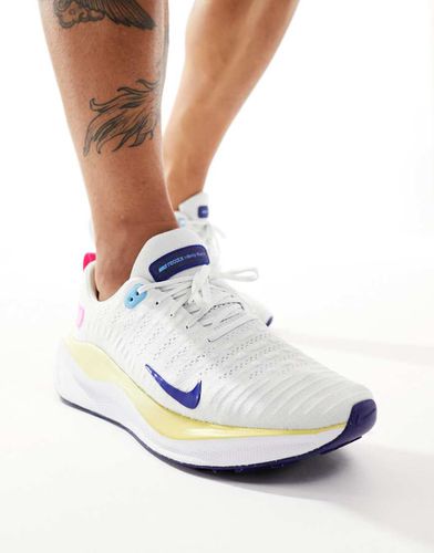 React Infinity Run Flyknit 4 - Sneakers bianche e oro - Nike Running - Modalova