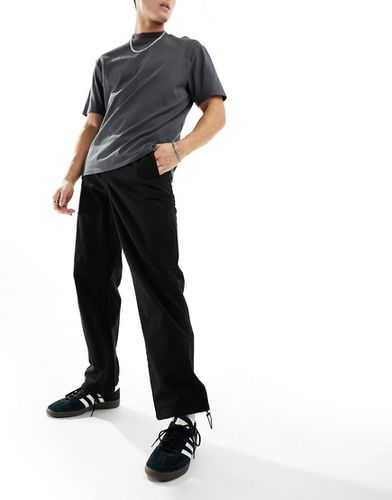 Pantaloni stile cargo neri vestibilità ampia - Selected Homme - Modalova