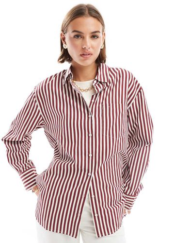 Camicia oversize rosso scuro a righe - Stradivarius - Modalova