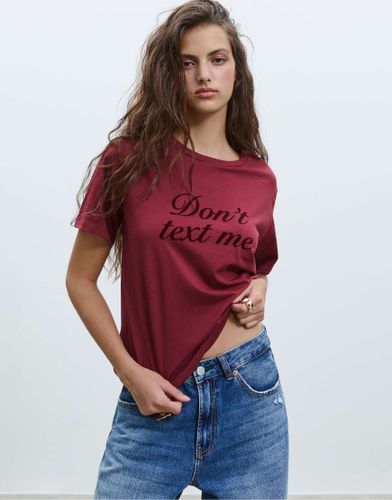 T-shirt à imprimé texte - Stradivarius - Modalova