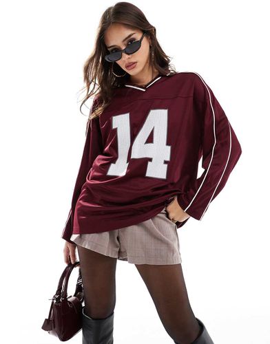 Top sportivo a maniche lunghe bordeaux - Stradivarius - Modalova