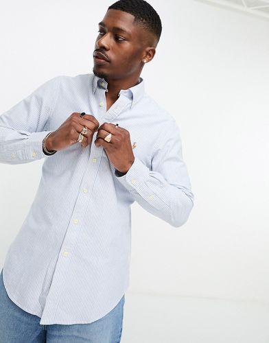 Camicia Oxford slim fit a righe e bianche con logo a icona - Polo Ralph Lauren - Modalova