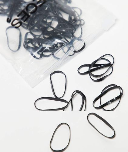 Confezione da 100 elastici per capelli neri - Pieces - Modalova