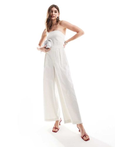 Tuta jumpsuit senza spalline color crema a righe con tasche - Pretty Lavish - Modalova