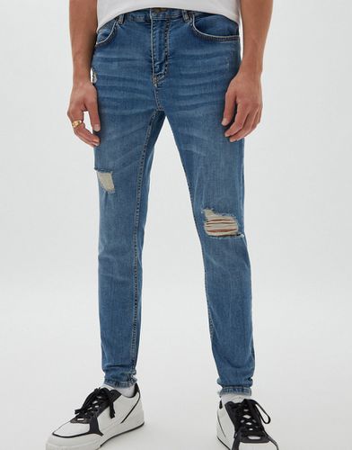Jeans skinny premium con strappi - Pull & Bear - Modalova