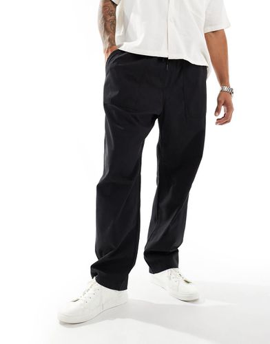 Pantaloni casual a fondo ampio neri - Pull & Bear - Modalova