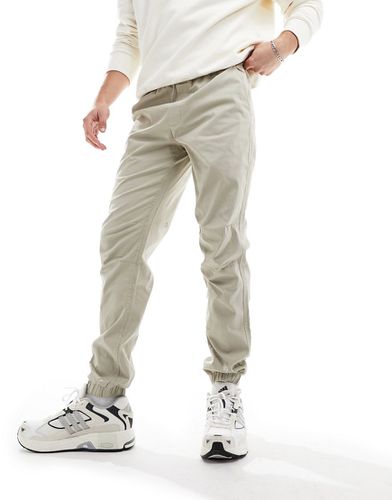 Pantaloni con fondo elasticizzato color sabbia - Pull & Bear - Modalova