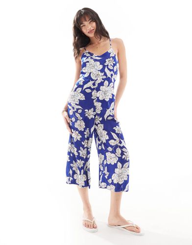 Tuta jumpsuit in raso con allacciatura al collo blu a fiori - QED London - Modalova