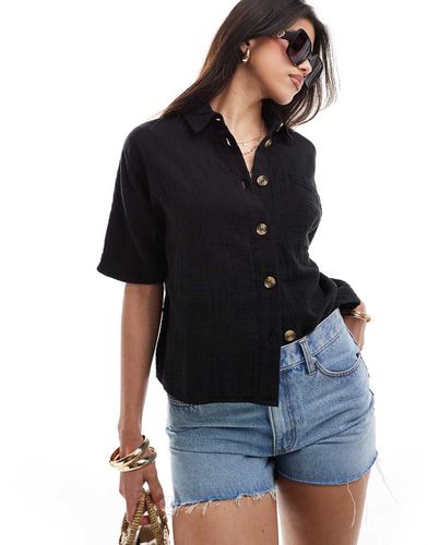 Camicia corta in lino nera - River Island - Modalova