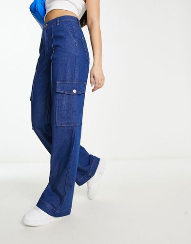 Jeans con fondo ampio a vita alta medio con tasche cargo - River Island - Modalova