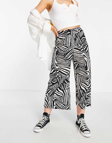 Pantaloni culotte neri stampati - River Island - Modalova