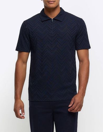 Polo a maniche corte navy con motivo a spina di pesce - River Island - Modalova