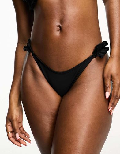 Slip bikini neri con volant e allacciatura laterale - River Island - Modalova