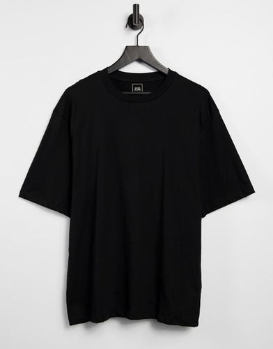 T-shirt oversize nera - River Island - Modalova