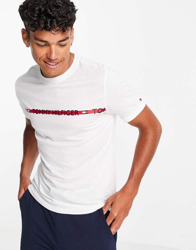 T-shirt da casa bianca con fettuccia con logo sul petto - Tommy Hilfiger - Modalova