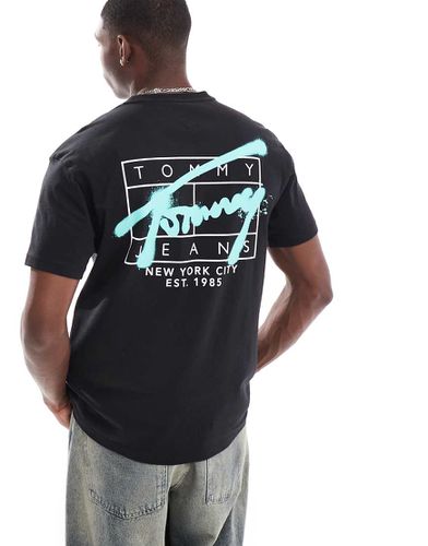 T-shirt nera con stampa del logo sul retro stile graffiti - Tommy Jeans - Modalova