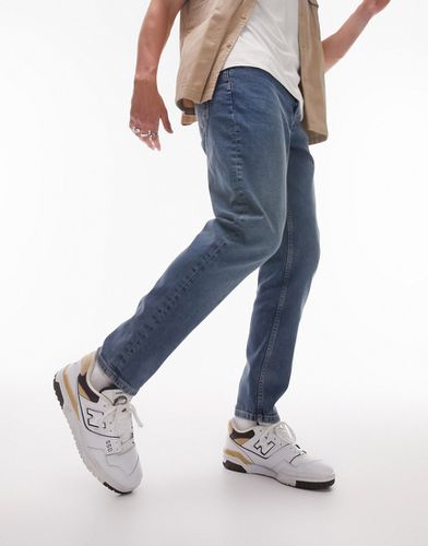 Jeans affusolati elasticizzati lavaggio medio - Topman - Modalova